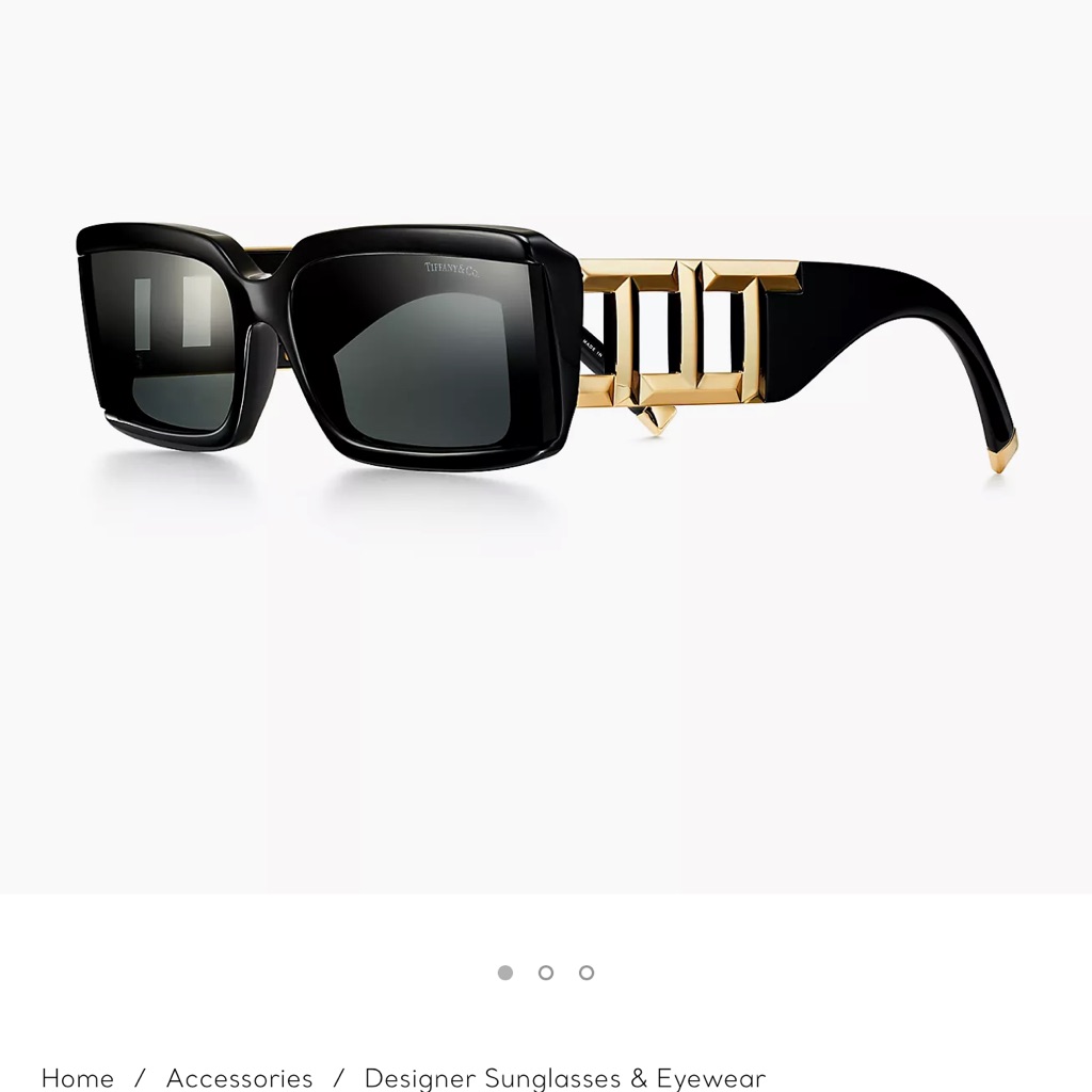 Classic Rectangular Sunglasses Get A Modern Twist With A Bold Repeating Tpattern